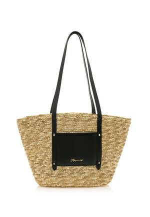 Bolso de tote de paja trenzada en color natural con un panel de cuero negro y asas. Presenta acentos en tono dorado y un diseño espacioso.