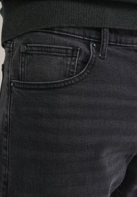 WE Fashion BLUE RIDGE - Straight leg jeans - black