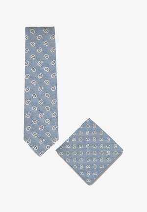Blauwe patroon stropdas en bijpassend pochet met kleine witte paisley ontwerpen op een gestructureerde achtergrond.