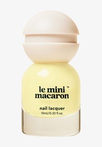 Lacca per unghie gialla in una bottiglia di vetro sferica con un tappo beige. Testo: "le mini macaron lacca per unghie, 10ml/0.33 fl. oz."