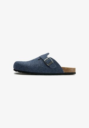 Blue felt clog with a cork sole, featuring a metallic buckle detail. The design is contoured with a rounded toe and side cutouts.
