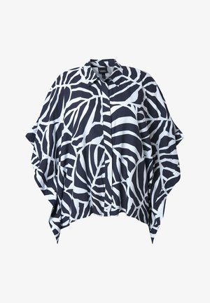 Black and white abstract zebra-stripe patterned blouse with wide, flowing sleeves and a pointed collar.