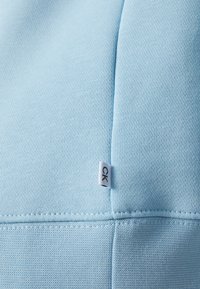 Calvin Klein Golf PLANET SPORTS SUIT - Trenirka - air blue