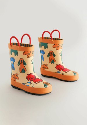 Gelbe Gummistiefel mit roten Griffen, die ein verspieltes, mehrfarbiges Hunde-Motiv zeigen. Strukturierte orangefarbene Sohle für Grip und Stabilität.