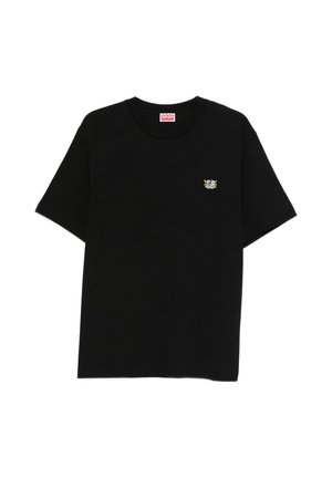 T-shirt noir à manches courtes avec un petit visage de tigre coloré brodé sur la poitrine gauche et une étiquette rouge KENZO à l'intérieur du col.