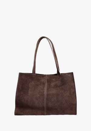 Pruun seemisnahast käekott kahe pika käepidemega, minimalistliku disainiga ja nähtava õmblusega esipaneelil.