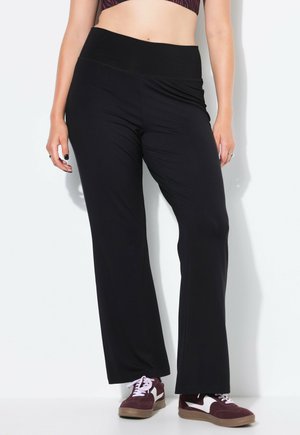 FLARED ELASTIKBUND - Stoffhose - black