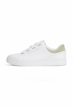 White leather sneaker with a low profile, featuring gray suede heel accent, round laces, and gold-tone eyelets. Logo printed on side.