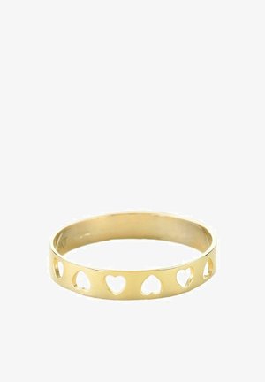 Zelta aproce ar izgrieztām sirds formām. Gluda, pulēta virsma ar vienmērīgu apaļu formu. Viegls dizains, elegants un vienkāršs.