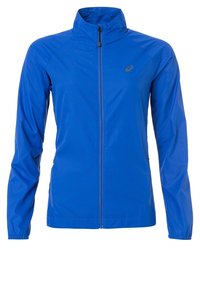 Veste légère bleue à zip intégral, col montant, manches longues et poches latérales, avec un petit logo sur la poitrine gauche.