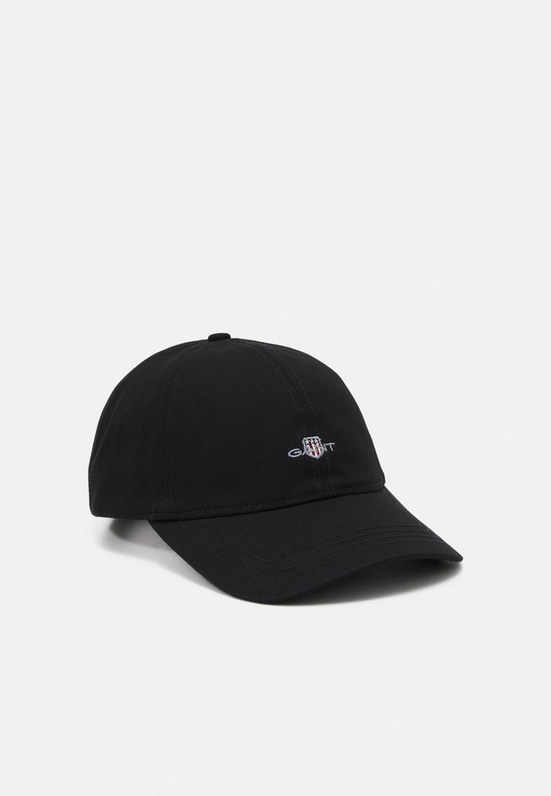 Black baseball cap with curved brim, cotton material, features embroidered logo on the front, and a button on top for design detail.