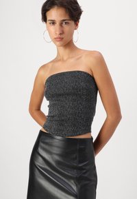 Vero Moda VMNELLY SHORT NOOS - Falda acampanada - black