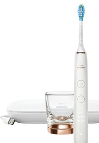 Spazzolino elettrico Sonicare con corpo bianco, dettagli dorati, testina blu e verde, bicchiere di ricarica trasparente e custodia di ricarica bianca.