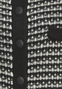 Adīta jaka - schwarz weiß kariert