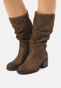mtng Botas - marron