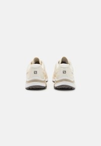 Salomon Sportstyle XT-WINGS 2 UNISEX - Športni copati - vanilla ice/white/feather gray
