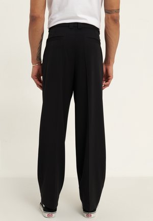 Pantalones - black