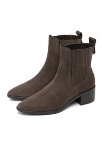 Brown suede ankle boots with a pointed toe, elastic side panels, and a low block heel. Includes pull tabs for easy wear.
