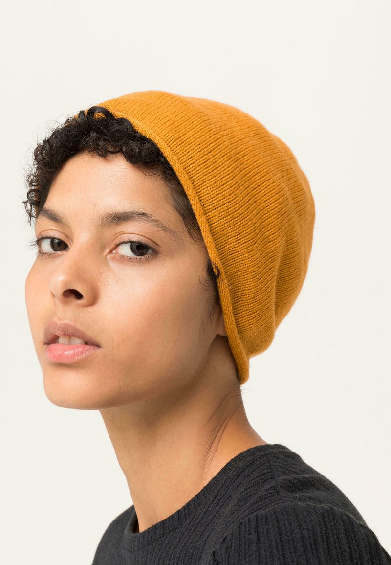 hessnatur Mütze - kurkuma/orange - Zalando.ch