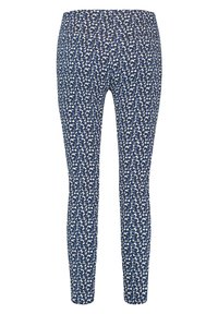 Collants bleu marine avec un motif floral blanc et bleu clair dispersé, fabriqués dans un tissu extensible, avec une texture lisse et une coupe ajustée.