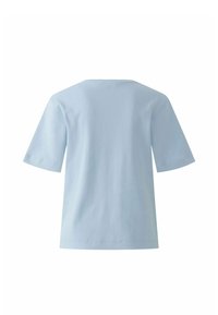 T-shirt bleu clair uni à manches courtes et col rond, vu de dos sur fond blanc.