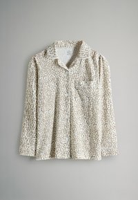 Leopardi-printtipaita beige- ja kermansävyissä, jossa napitettu edessä, kaulus ja rintatasku. Pehmeä kangas ja pitkät hihat.