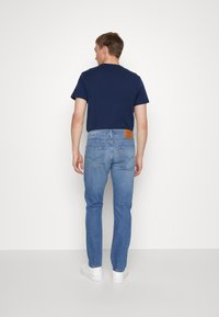 Levi's® 502® TAPER - Jeans Tapered Fit - blue