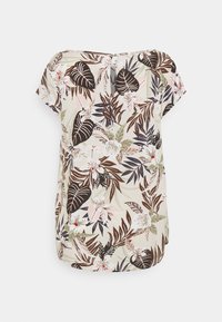 Beige blus med kort ärm och tropiska blommönster och blad i brunt, rosa, grönt och vitt, med en liten knäppning bak.