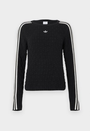 Čierny pletený sveter s textúrovaným povrchom, dlhými rukávmi, okrúhlym výstrihom a bielymi pruhmi na bokoch s vyšitým logom na hrudi.