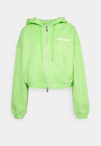 Felpa corta con zip in tessuto di cotone verde acceso, dotata di cappuccio, cerniera frontale e logo bianco sul petto a sinistra. Maniche ampie.