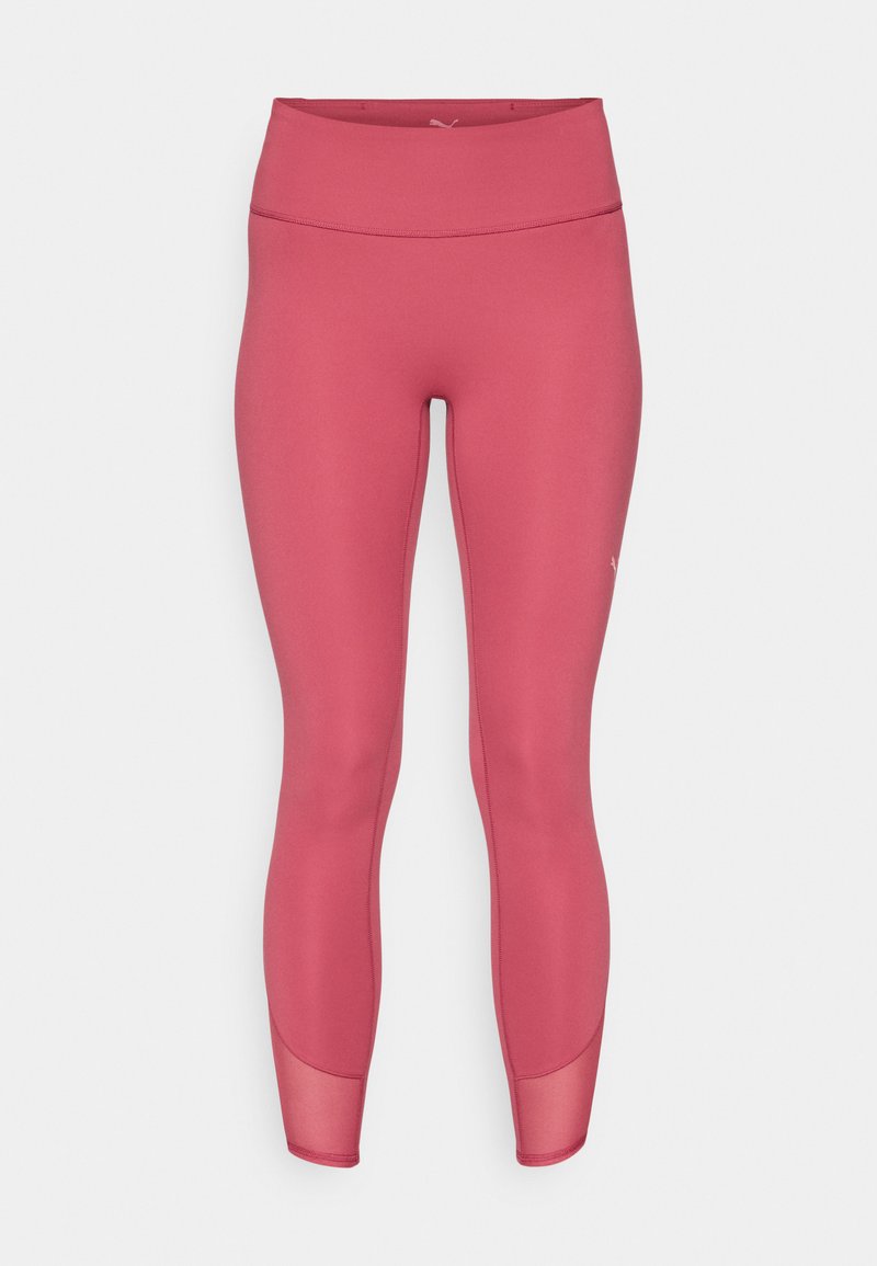 Puma Leggings in einem mittelpink Farbton, aus einem glatten, dehnbaren Stoff mit einem hohen Bund und Netzakzenten in der Nähe der Knöchel.