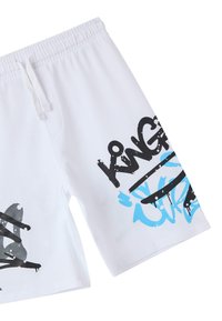 Shorts bianchi in cotone con stampe in stile graffiti nere e blu. Presentano una vita elastica con cordino per una vestibilità regolabile.