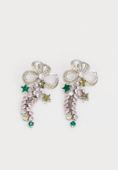 Silver-tone earrings featuring a bow design, adorned with pink, green, and yellow stones, including stars and oval shapes.