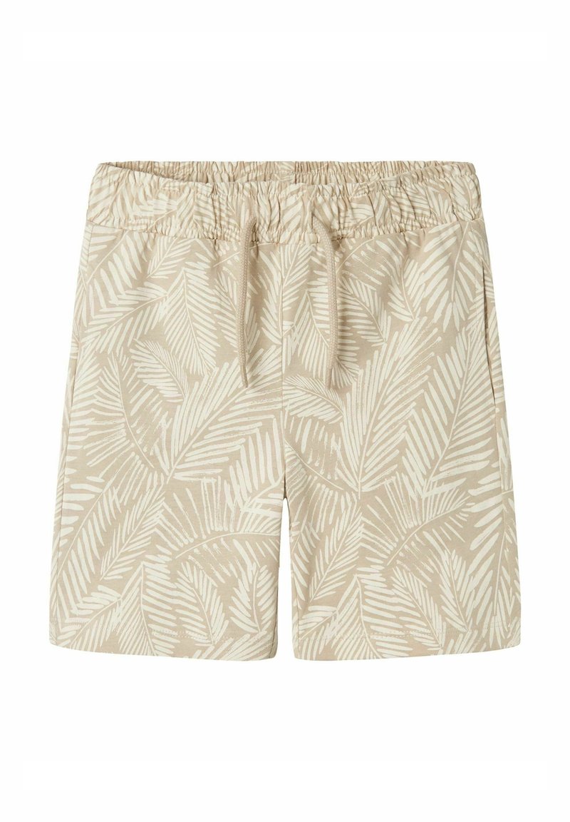Short beige avec motif de feuilles tropicales blanches, taille élastique et cordon à l'avant, présenté à plat sur fond blanc.