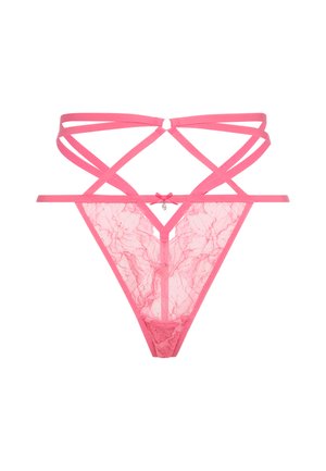 Pink lace thong with crisscross strap design. Features a small bow and charm detail at the back, highlighting delicate floral patterns.