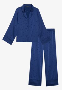 Set di pigiama in satin blu navy con top a maniche lunghe e pantaloni con elastico in vita, caratterizzato da un motivo di stelle e lune crescenti.