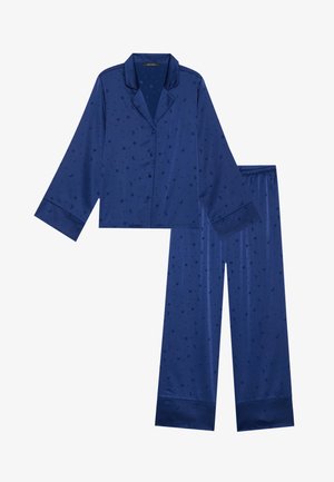 Conjunto de pijama de satén azul marino con parte superior de manga larga y pantalones con cintura elástica, que presenta un patrón de estrellas y lunas crecientes.