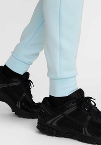 TECH FLEECE - Träningsbyxor - glacier blue black