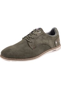 Scarpa in pelle verde forata con punta rotonda, design con lacci e suola bianca a contrasto. Presenta accenti rossi e interno texturizzato.