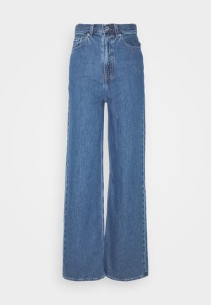 HIGH LOOSE - Flared Jeans - blue denim