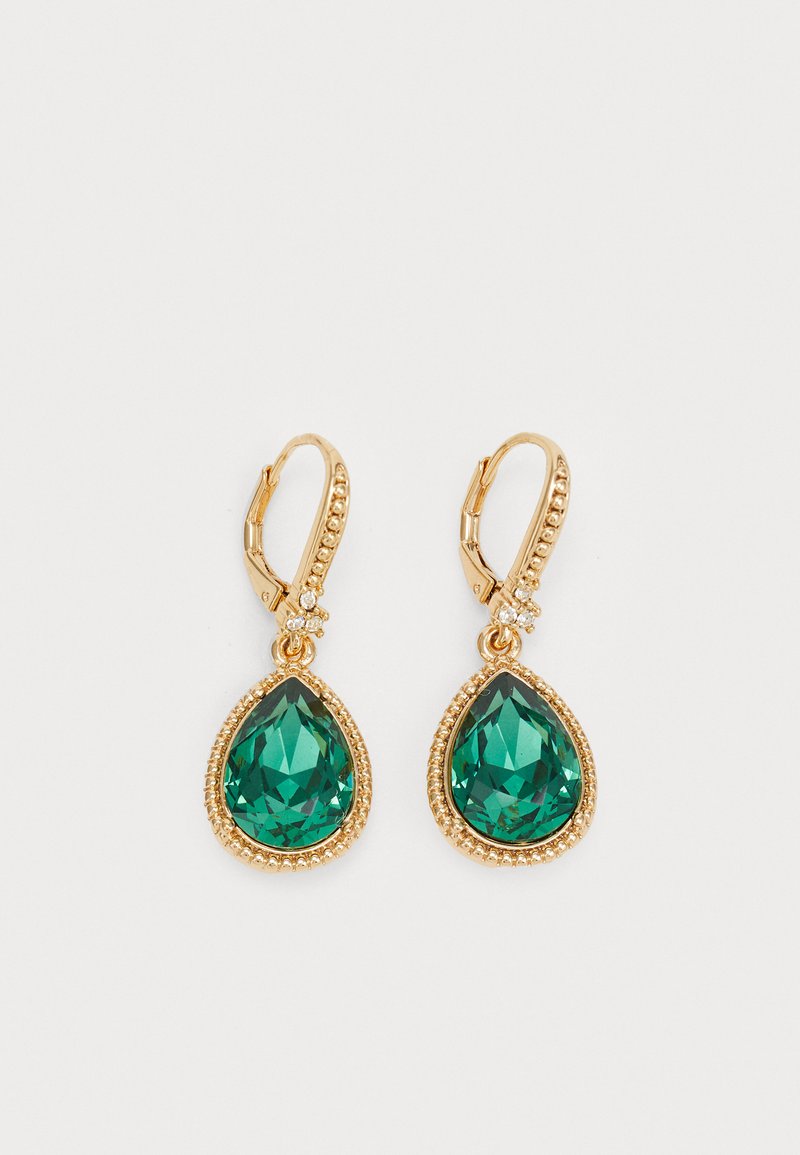 Gold-tone earrings featuring a pear-shaped green gemstone with faceted surface, accented by small crystals at the top. Textured metal design.