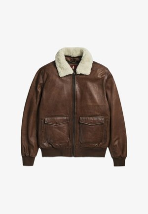 Giacca bomber in pelle marrone con collo in shearling crema, due tasche sul petto, chiusura con zip frontale e polsini e orlo a coste.
