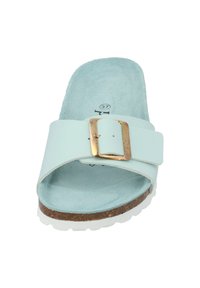 Lichtblauwe schuin met een brede band, gouden gespdetail, gevoerd met textiel en een kurken zool met een witte rubberen buitenzool. Maat 37.