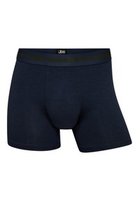 Boxer ajustados azul marino con una tela suave y elástica. Cuenta con una cinturilla elástica negra con "JBS UNDERWEAR" impreso en la parte superior.