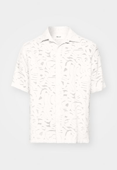White short-sleeve shirt featuring a textured, cut-out pattern. Standard collar and button closure, with a loose-fitting design.