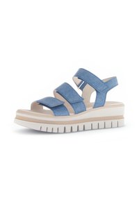 Blauwe stoffen wedge sandalen met drie verstelbare banden, voorzien van een dikke witte zool met een gestructureerde onderkant en een zachte beige binnenzool.