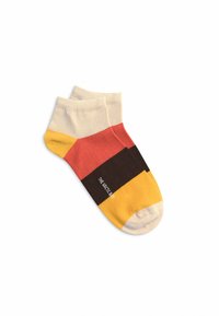 Baumwoll-Sneakersocken mit einem Farbblockdesign in Beige, Rot, Dunkelbraun und Gelb sowie einer weißen Tipp. Mit Branding an der Seite.