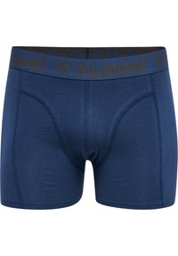Marinblå boxershorts i mjukt tyg, med en svart elastisk midjeband som har "hummel"-logotyp. Platta sömmar och design med formad ficka.