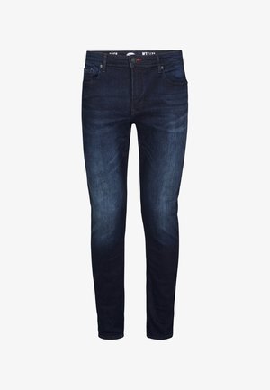 Jeans skinny de culoare albastru închis din denim cu o textură netedă. Prezintă buzunare frontale, bucle pentru curea și un mic eticheta a brandului pe talie.