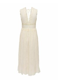 Sleeveless cream midi dress with deep V-neck, lace detailing on bodice, wide waistband, and a tie closure at the back of the neck.
